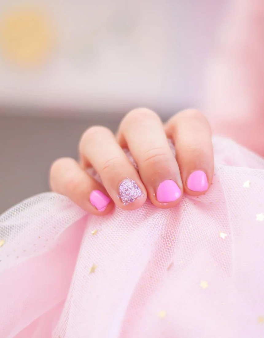 Kids' Oh Flossy nail polish bottle in cream violet with colorful cap, designed for children’s safe, fun nail coloring.