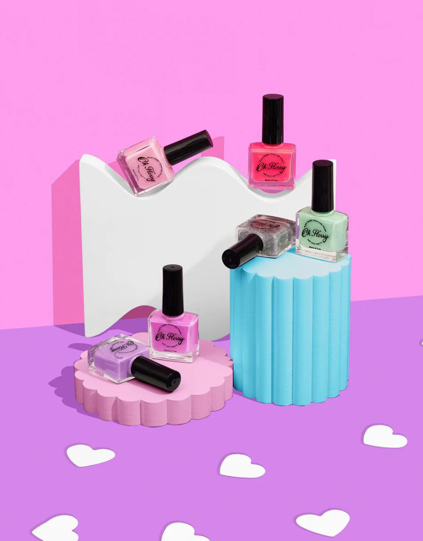 Kids nail polish by Oh Flossy in cream violet, featuring a colorful bottle with playful design and vibrant purple shade.