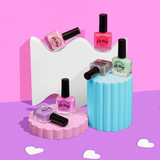 Kids nail polish by Oh Flossy in cream violet, featuring a colorful bottle with playful design and vibrant purple shade.