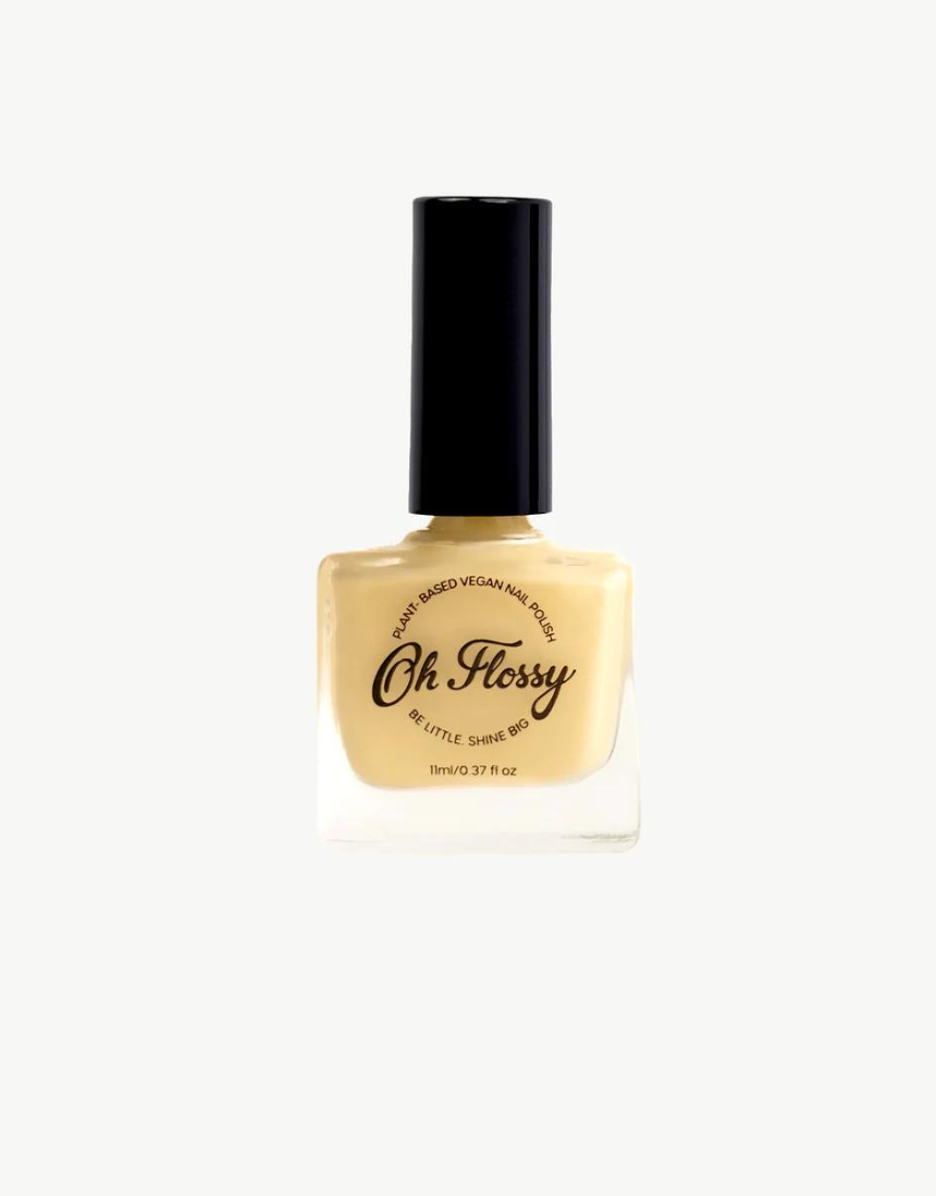 Kids nail polish by Oh Flossy in a creamy violet color, shown in a small bottle with a brush applicator.