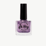 Kids' Oh Flossy nail polish in cream violet, featuring a colorful bottle with playful design for children's nail art.
