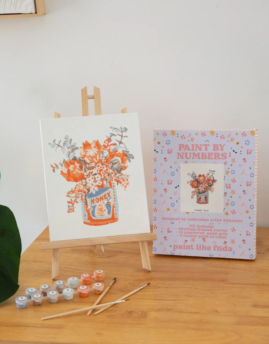 Paint Like Frida mini art easel with a paint-by-numbers kit featuring Frida Kahlo artwork, perfect for creative art projects.