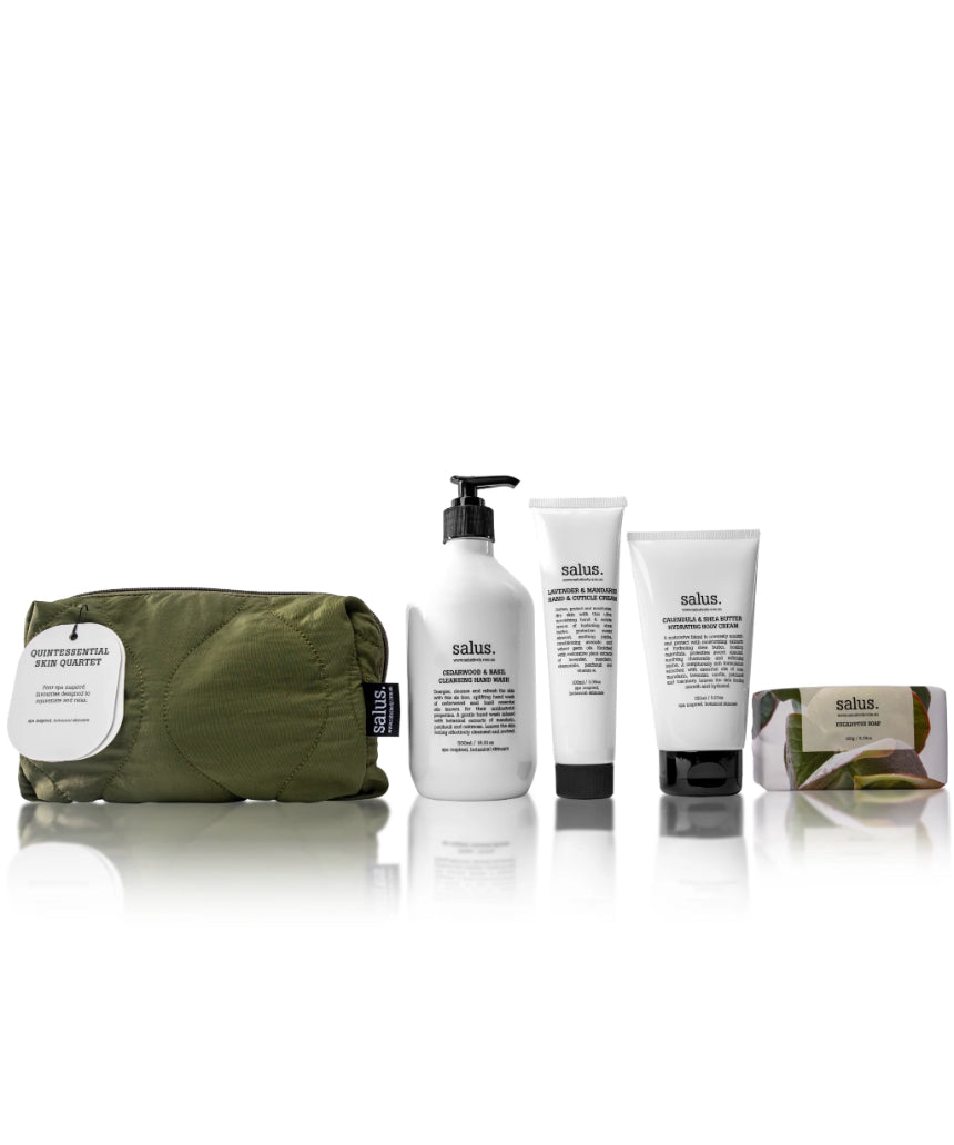 Salus Quintessential Skin Quartet skincare set with four products displayed in sleek packaging on a neutral background.