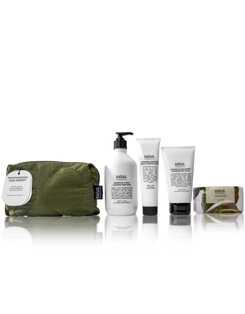Salus Quintessential Skin Quartet skincare set with four products displayed in sleek packaging on a neutral background.
