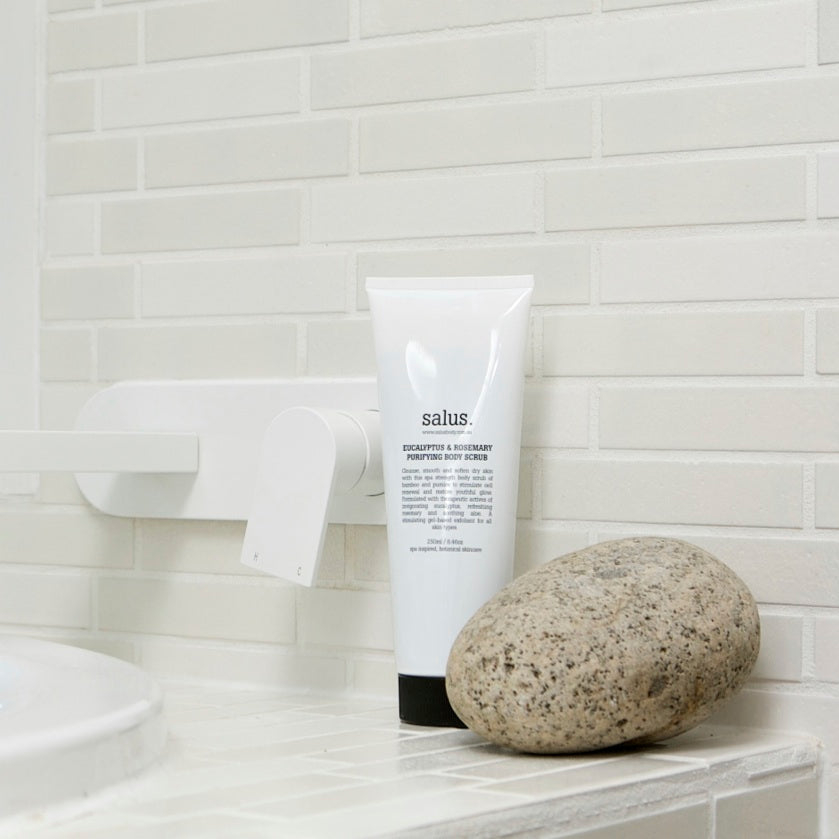 Salus Eucalyptus & Rosemary Purifying Body Scrub in a 250ml container, showing the textured scrub with natural ingredients.