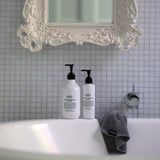 Salus Geranium & Juniper Berry Body Wash 500ml bottle with label, showing fresh floral and berry ingredients.