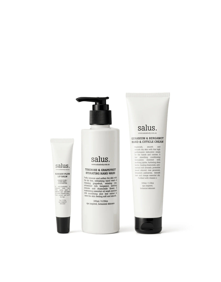 Salus Body Hand & Lip Replenishing Trio gift set with hand cream and lip balm in decorative packaging.