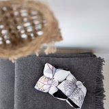Salus Lavender & Barley Heat Pillow in grey with botanical design, showcasing the soft fabric and calming lavender scent.