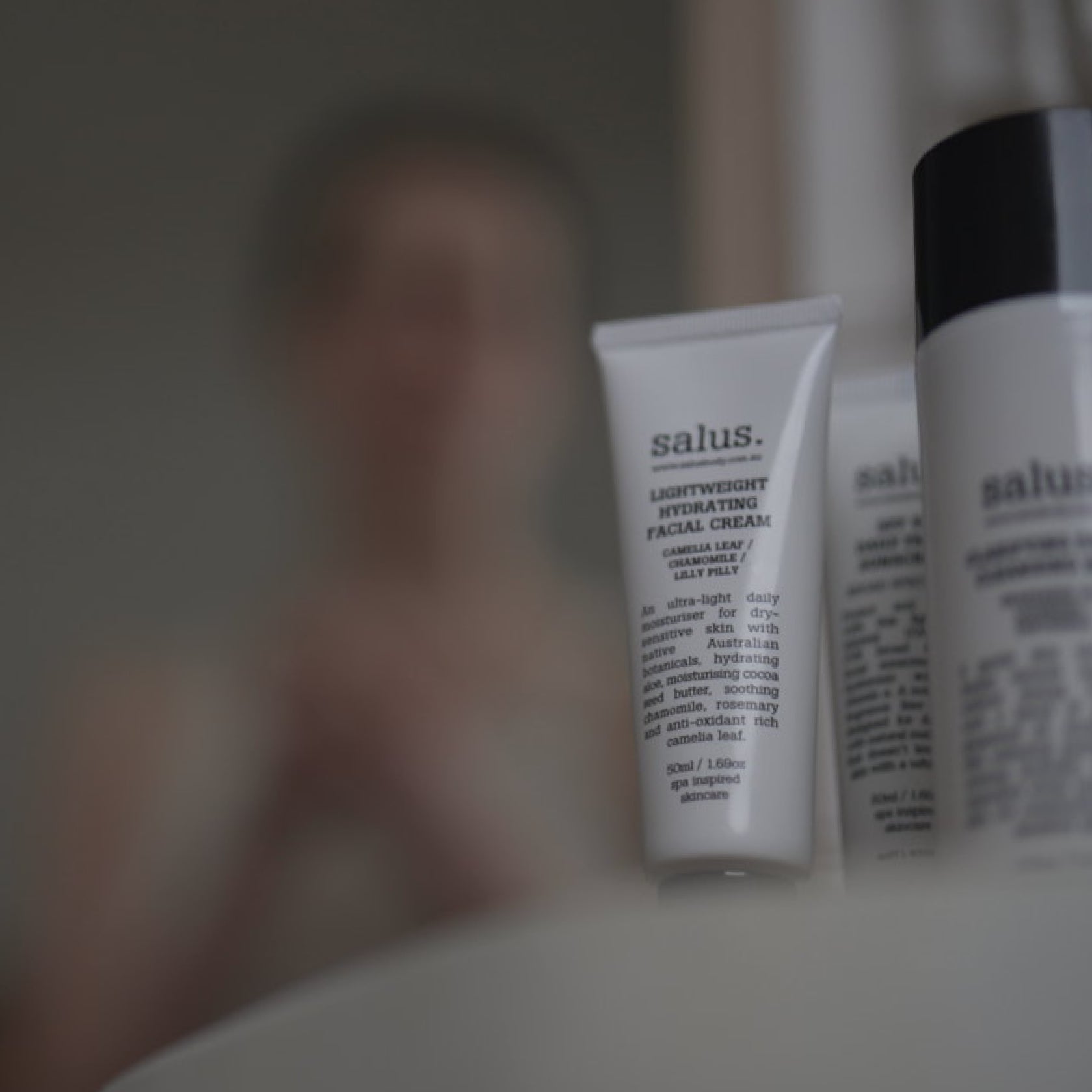 Salus Body Lightweight Hydrating Facial Cream 50ml jar, smooth texture, and moisturizing formula for radiant skin.