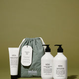 Salus Luminous Skin Trio gift set with skincare products displayed in a lifestyle setting, highlighting luminous, radiant skin.