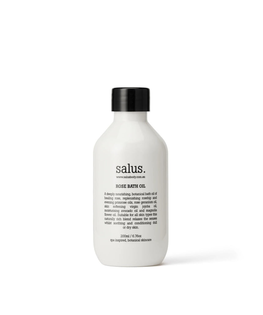 Salus Rose Bath Oil 200ml bottle with rose petals and oil, designed for soothing and aromatic bathing experiences.