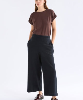 Black Elk Sanna Pant, stylish and comfortable pants displayed on a model, showcasing the modern design and fit.