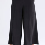 Black Elk Rema Pant displayed on a model, showcasing slim fit style and sleek design for versatile casual or semi-formal wear.