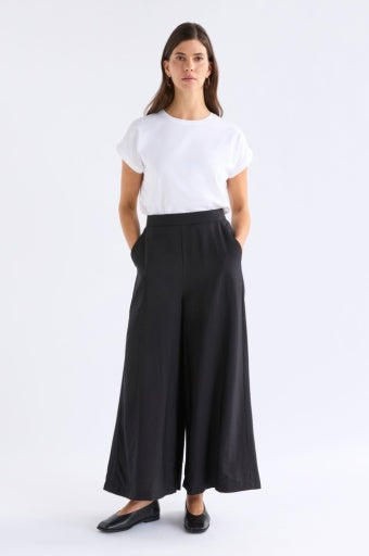 Black Elk Rema Pant showing slim-fit design and tapered leg, made from comfortable fabric for casual or stylish wear.