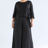 Black Elk Rema Pant showing slim-fit design, front pockets, and sleek fabric for casual and stylish wear.