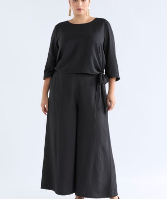 Black Elk Rema Pant showing slim-fit design, front pockets, and sleek fabric for casual and stylish wear.
