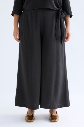 Black Elk Rema Pant shown on a model, featuring a relaxed fit with a comfortable waistband and tapered leg design.
