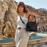 Status Anxiety Mini Mountains Bag in black, stylish small bag with adjustable strap, perfect for casual everyday use.