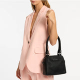 Black Status Anxiety Mini Mountains bag with sleek design, shown in a lifestyle setting, perfect for casual and everyday use.
