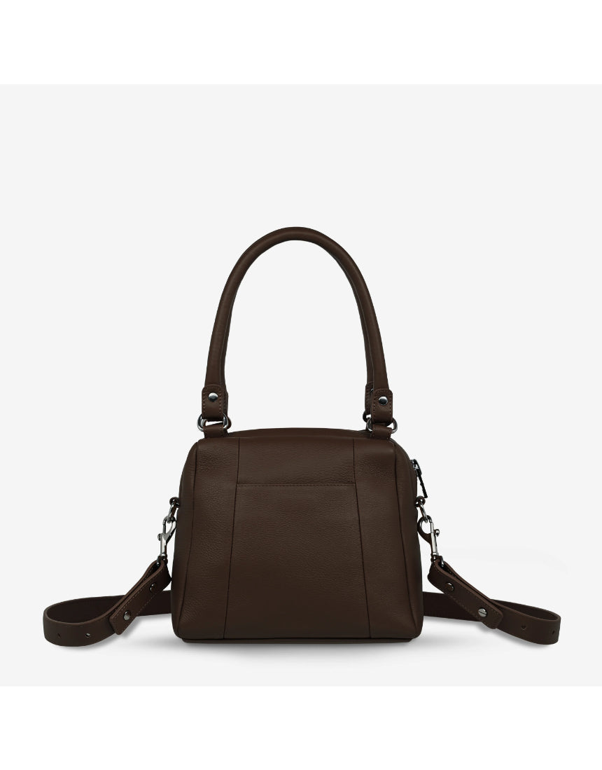 Status Anxiety Mini Mountains Bag in cocoa color, stylish bag with mountain-inspired design and adjustable strap, front and back views.