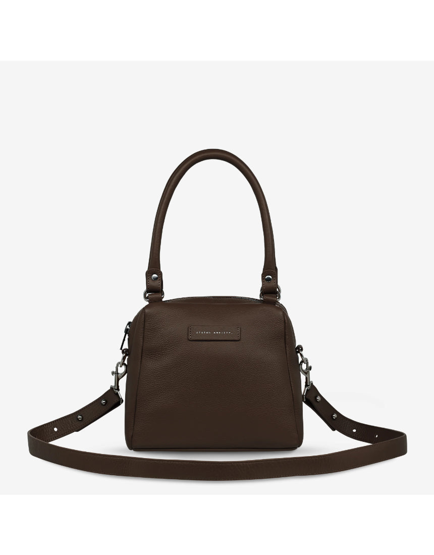 Status Anxiety Mini Mountains Bag in cocoa color, stylish bags with mountain-inspired design and front flap closure.