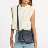 Mini Mountains Bag by Status Anxiety, midnight blue leather bag with sleek design, perfect for casual and everyday use.
