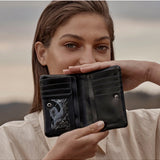 Black Status Anxiety Is Now Better Wallet with multiple card slots and sleek design, ideal for everyday use.