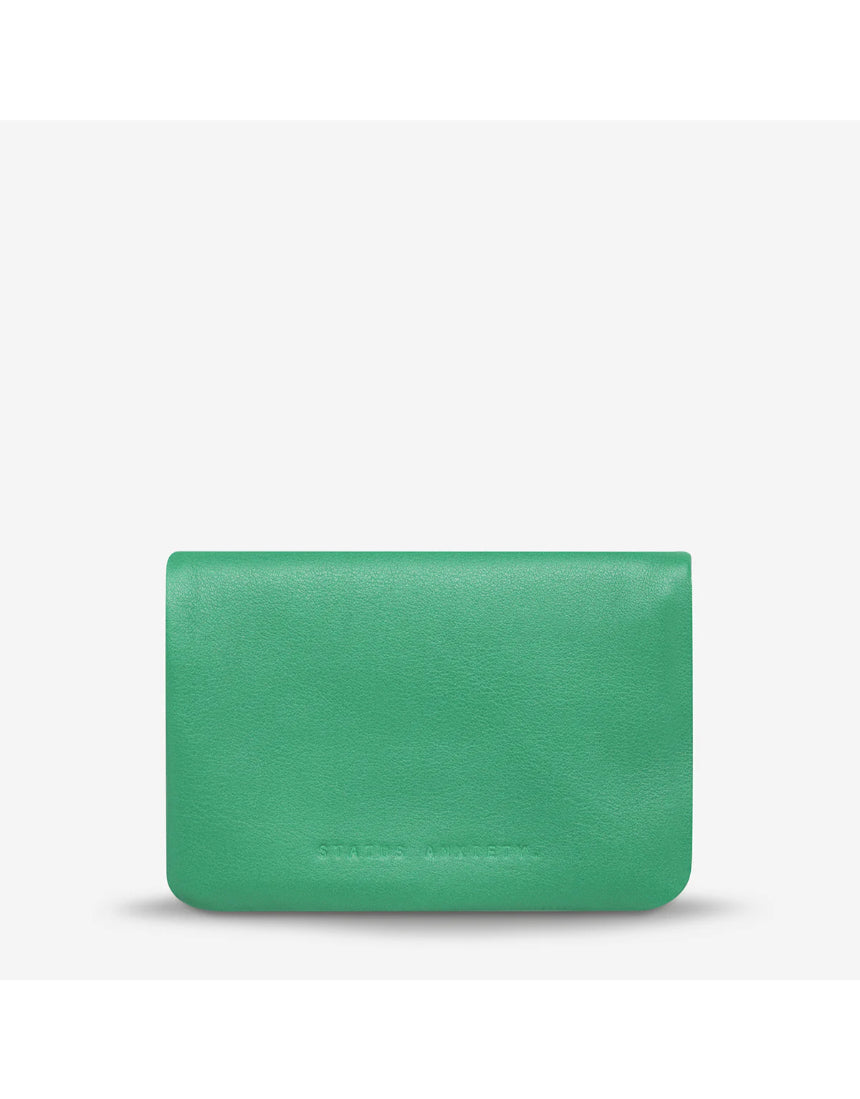 Status Anxiety Is Now Better Wallet in emerald with smooth front, featuring a sleek, modern design for everyday use.