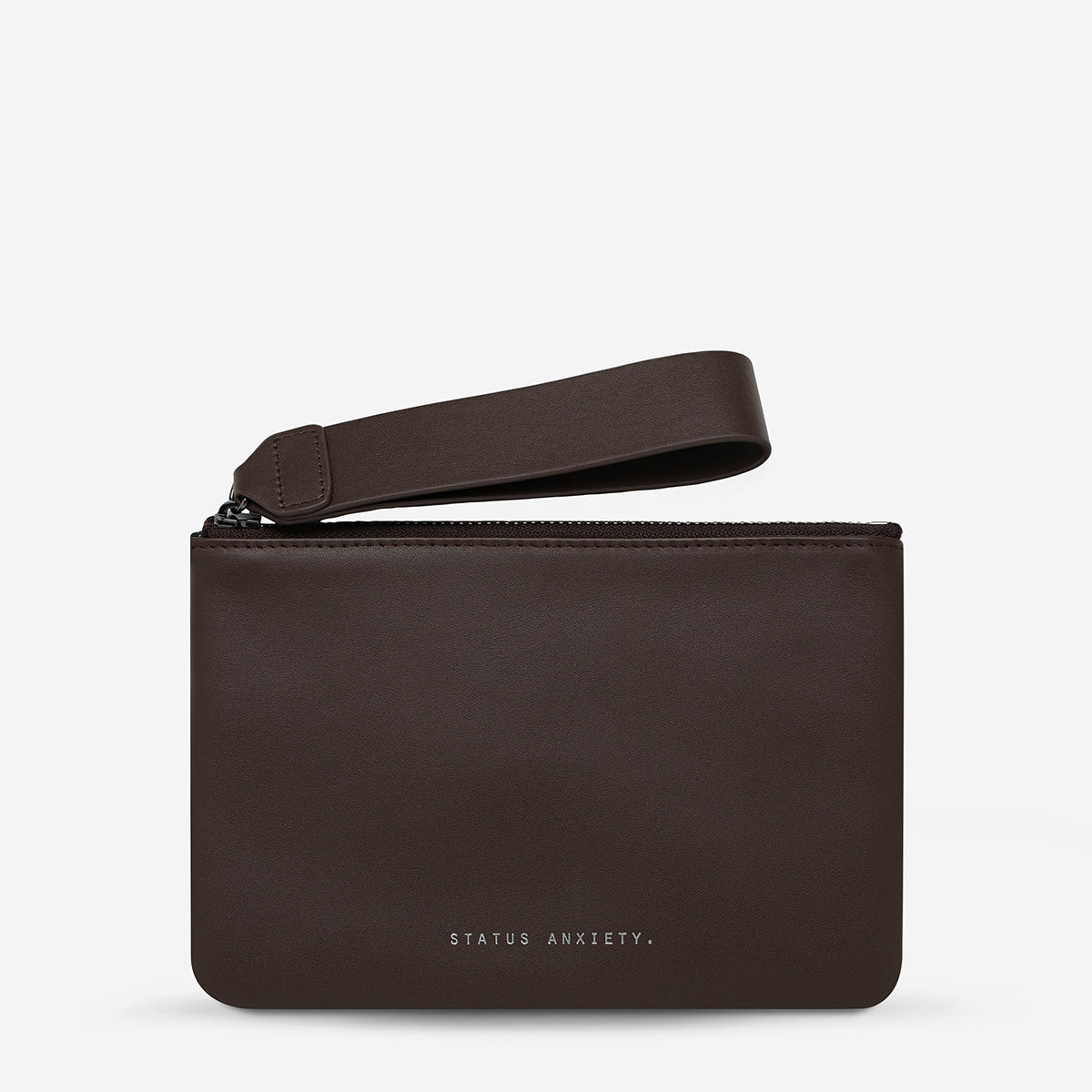 Status Anxiety Take Your Chances wallet in cocoa leather showing smooth front with subtle branding and compact design.