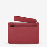 Status Anxiety Take Your Chances Wallet in rouge with a smooth back, stylish leather wallet designed for everyday use.