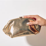 Olga Berg Tally metallic gold clutch bag with sleek design and shiny finish, perfect for evening or special occasions.