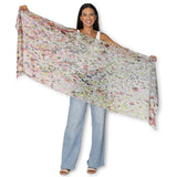 The Artists Label Julie’s Garden scarf featuring a vibrant floral pattern on soft fabric, displayed flat in natural light.