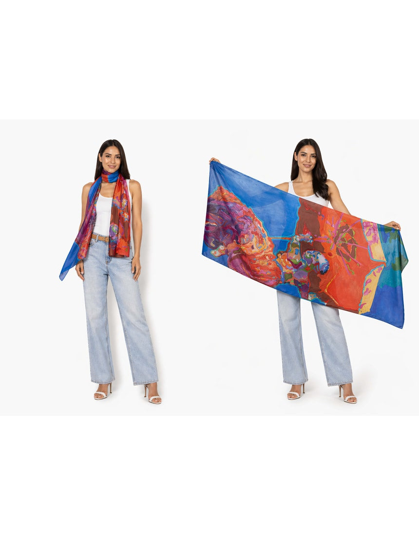 The Artists Label Take It Away Sibyl silk chiffon scarf featuring vibrant floral patterns and lightweight, flowing fabric.