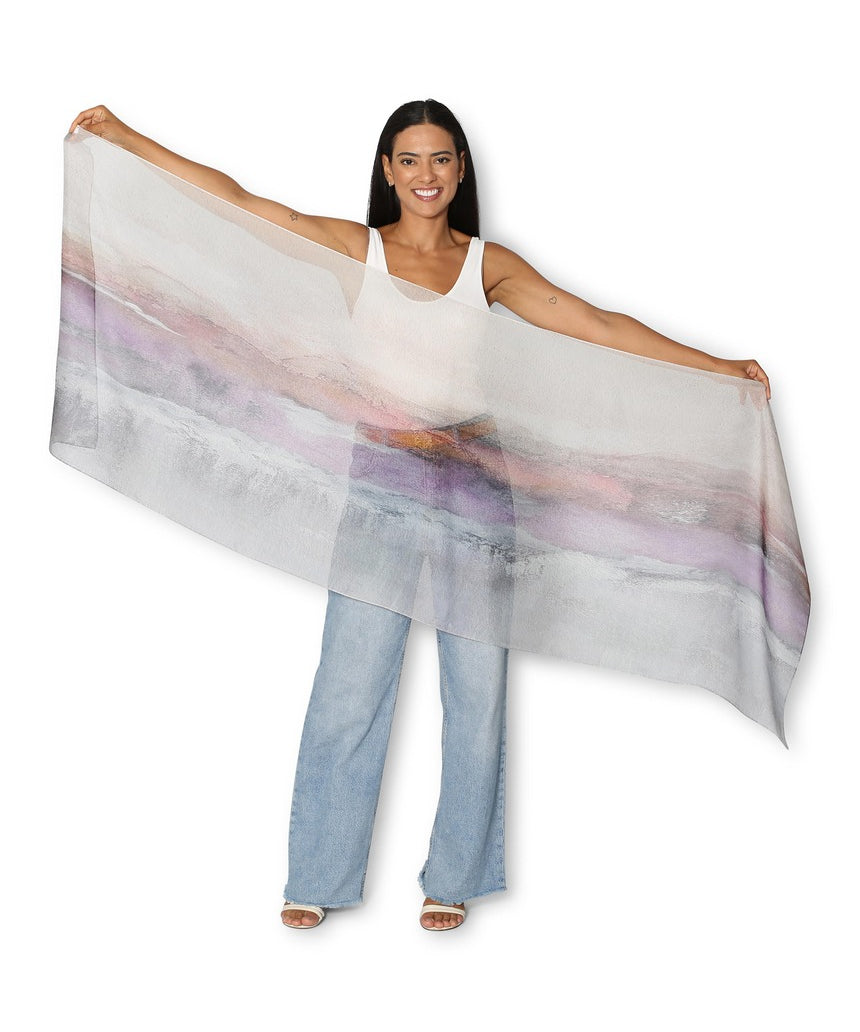The Artists Label Transformation silk chiffon scarf featuring vibrant abstract patterns in bright colors and flowing fabric.