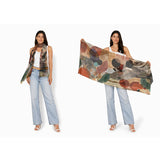 The Artists Label Atelier viscose modal scarf featuring a soft, flowing fabric with a stylish, artistic pattern in vibrant colors.