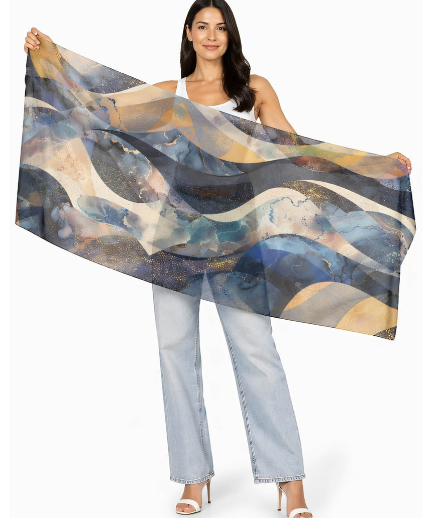The Artists Label Celestial Waves viscose modal scarf featuring a flowing wave pattern in soft blue and white tones.