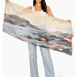 The Artists Label Coastal Mist viscose modal scarf with soft, flowing fabric in a gentle misty blue color.