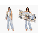 The Artists Label Echoes of Creation viscose modal scarf with abstract pattern and soft, flowing fabric in vibrant colors.