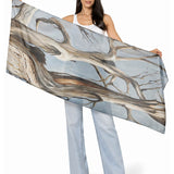The Artists Label Reaching Light viscose modal scarf featuring soft, flowing fabric with a subtle, artistic light-themed design.