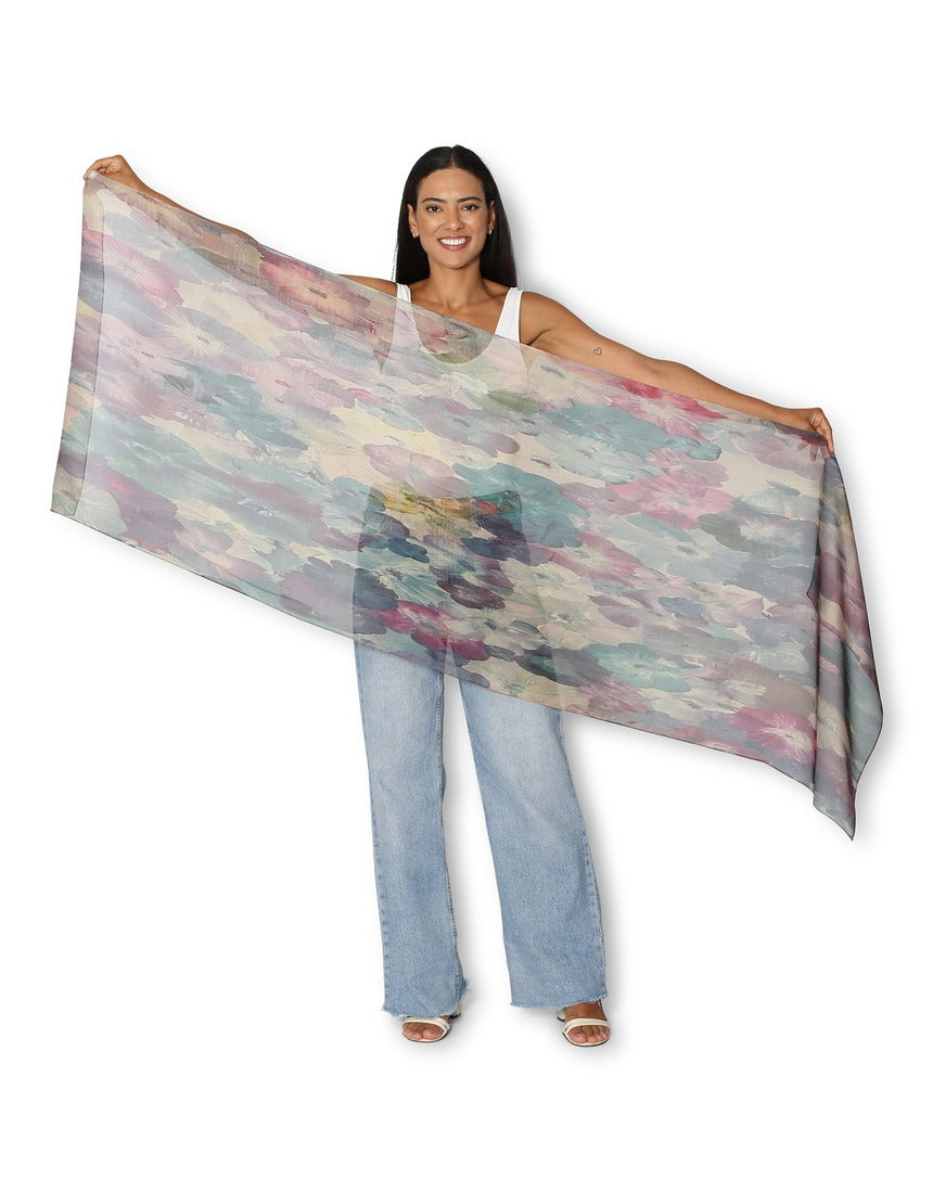 Silk chiffon scarf by The Artists Label featuring a delicate wandering through petals floral pattern in soft colors.