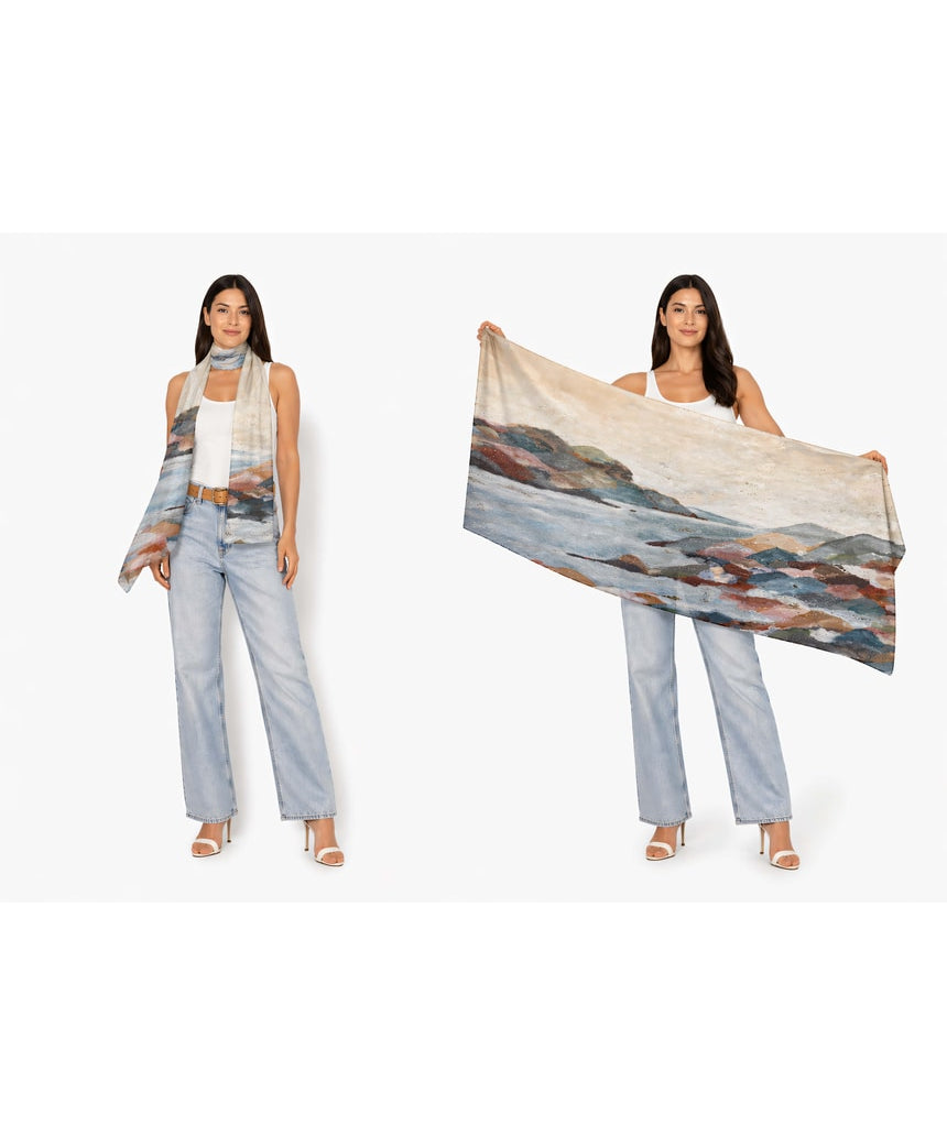 Wool scarf by The Artists Label in Coastal Mist color, featuring soft fabric and stylish design, displayed draped on a neutral background.