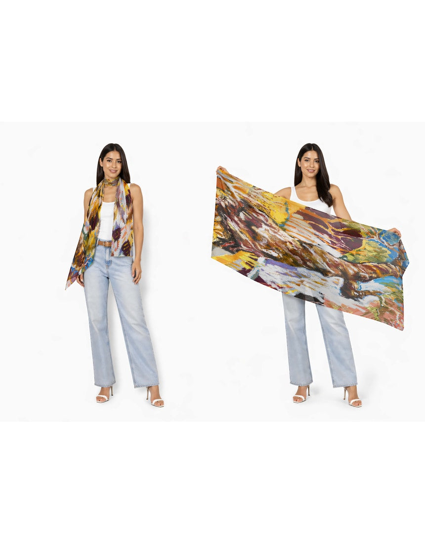 The Artists Label The Source wool scarf featuring soft, warm fabric with a stylish design in neutral tones.
