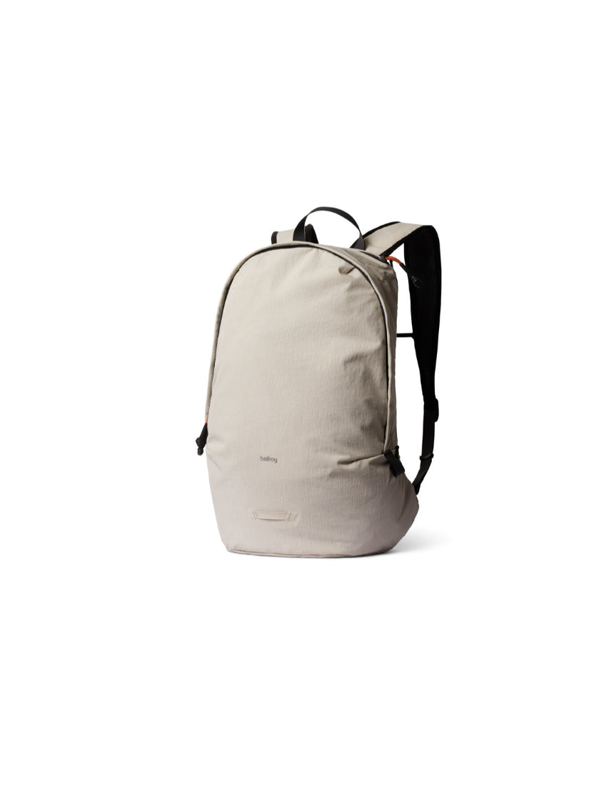 Bellroy Lite Daypack in ash color, compact and lightweight backpack with multiple compartments and padded shoulder straps.