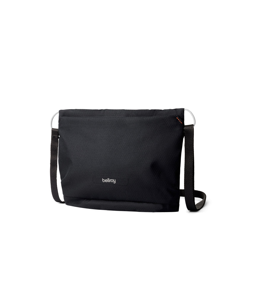 Bellroy Lite Sacoche in black, stylish compact shoulder bag with minimalist design and adjustable strap.