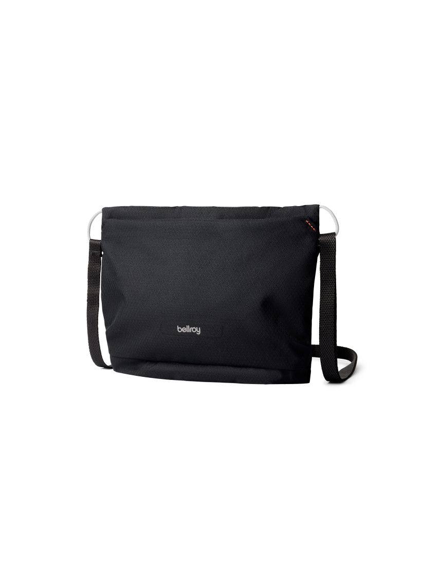Bellroy Lite Sacoche in black, stylish compact shoulder bag with minimalist design and adjustable strap.