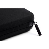 Bellroy Tech Kit in black with organized compartments for cables, chargers, and accessories, compact and stylish travel organizer.