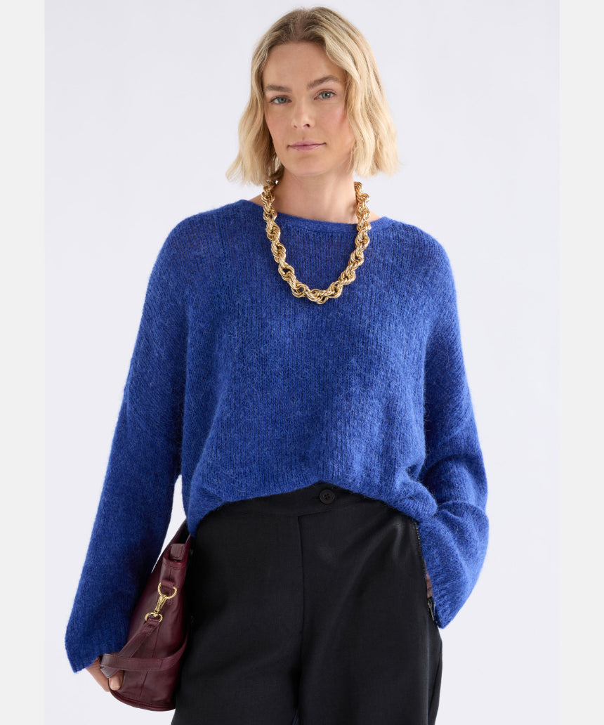 Elk Agna Sweater in deep cobalt, featuring a cozy knit design and ribbed cuffs, perfect for casual winter wear.