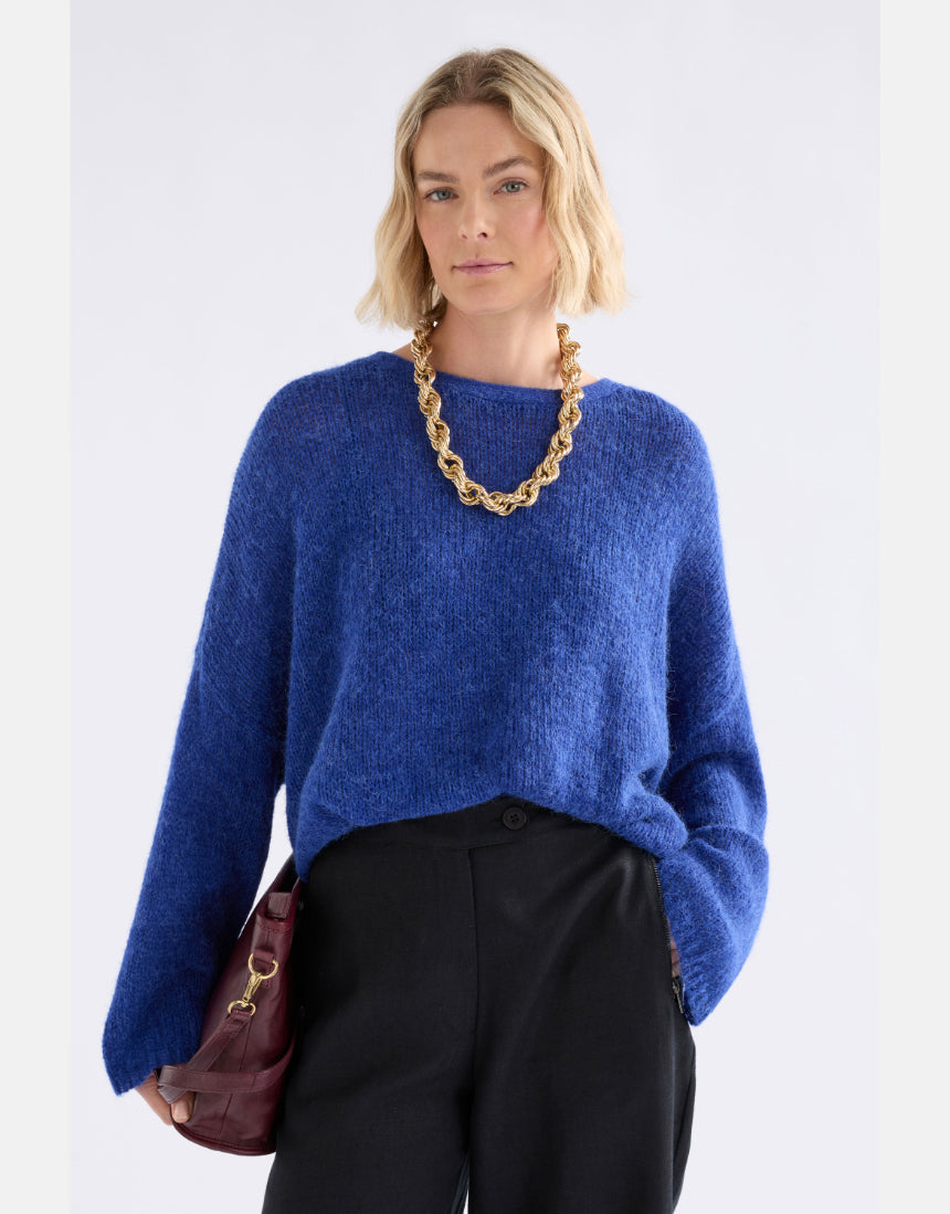 Elk Agna Sweater in deep cobalt, featuring a cozy knit design and ribbed cuffs, perfect for casual winter wear.