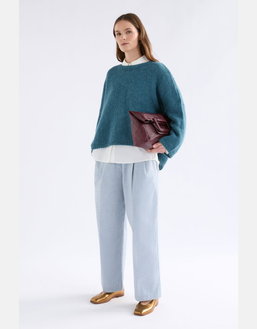 Elk Agna sweater in stone blue, cozy knit clothing with a relaxed fit and ribbed cuffs, stylish and comfortable.