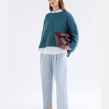 Elk Agna sweater in stone blue, cozy knit clothing with a relaxed fit and ribbed cuffs, stylish and comfortable.